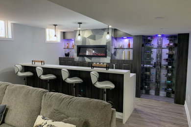 Basement - large modern basement idea in Toronto