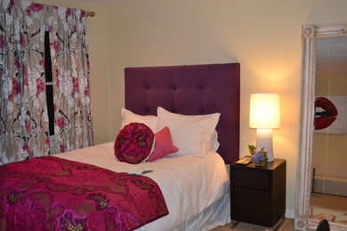 Inspiration for a mid-sized transitional guest carpeted bedroom remodel in Boston with beige walls and no fireplace