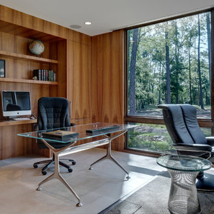 Contemporary home office in Dallas with limestone floors.