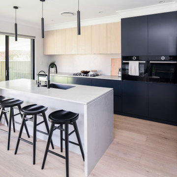 Modern Kitchen with Dark Blue Cabinets