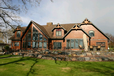Rustic exterior home idea in Minneapolis