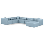 Meridian Furniture - Cube Upholstered Modular Sectional, Light Blue, 7-Piece: 3 Armless Chair, 3 Corner Chair, 1 Ottoman, Vegan Leather - Elevate your space with the luxurious Cube Vegan Leather Modular Sectional. This modular sectional exudes modern elegance, charm, and comfort making it a perfect addition to any contemporary living space. Its clean lines and cube shape are reminiscent of minimalist design, while the plush light blue vegan leather upholstery adds a touch of luxury and sophistication. The chair's versatile construction and geometric aesthetic seamlessly integrate into various design styles, from sleek living rooms to chic home offices, embodying the essence of modern design and creating a sense of order and tranquility in your space.