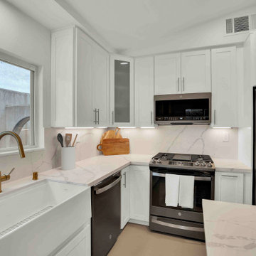 Laguna Hills Bright Kitchen with Quartz Backsplash, Wine Fridge & Brass Hardware