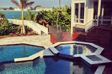 Example of an island style pool design in Miami