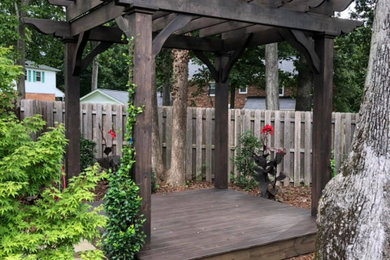 Example of an arts and crafts deck design in Other