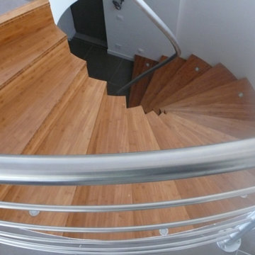 Garde-corps en inox pour escalier intérieur en colimaçon