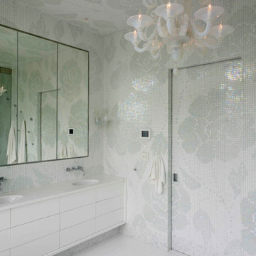 Floral tile mosaic motif continues throughout the room