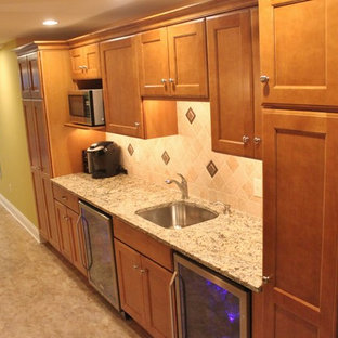 This is an example of a medium sized classic fully buried basement in Philadelphia with yellow walls, no fireplace, beige floors and vinyl flooring.