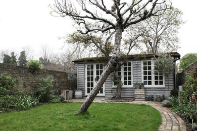 This is an example of a medium sized classic detached office/studio/workshop in Kent.