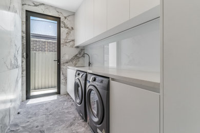This is an example of a laundry room in Sydney.