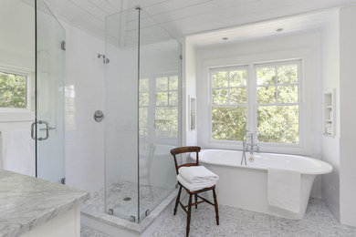Design ideas for a beach style bathroom in Charleston with an alcove shower, a freestanding tub and subway tile.