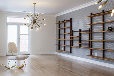 Living room - large contemporary open concept light wood floor living room idea in DC Metro with multicolored walls