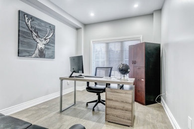Inspiration for a modern home office remodel in Toronto