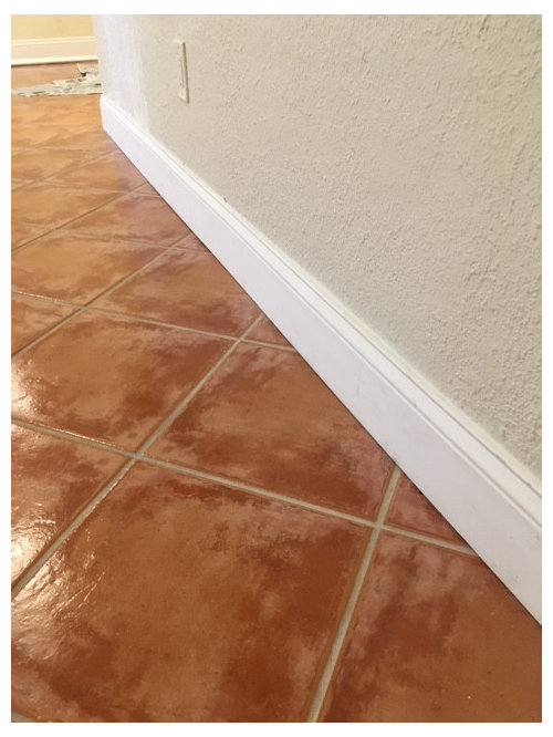 Floor Tile Baseboard Caulk Or, How To Install Quarter Round On Tile