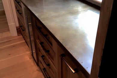 Zinc countertop with brass nail accents