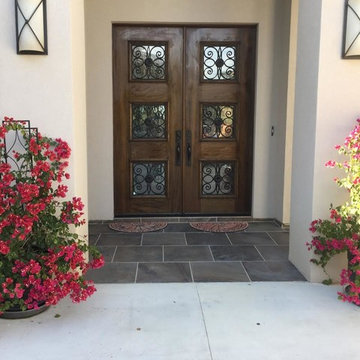 Wood Doors with Wrought Iron
