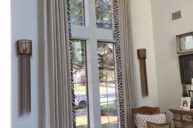 Example of an eclectic family room design in Dallas