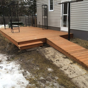 Large deck with a detachable accessibility ramp
