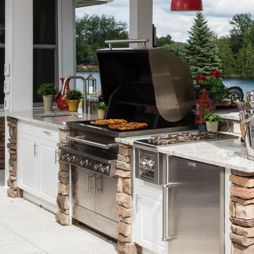 Luxurious White Outdoor Kitchen - Accented by Stone