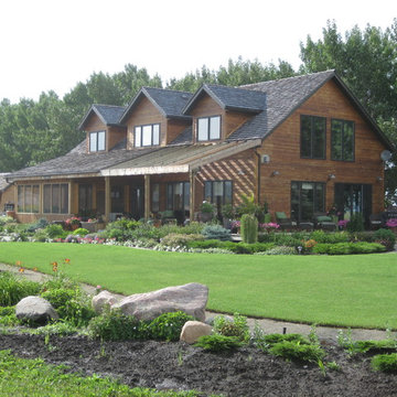 Farm House situated on beautifully landscaped yard, overlooking the wide open pr