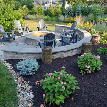 Framed and privately planted firepit