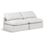 Meridian Furniture - Indulge Upholstered Modular Sofa, Cream, 2-Piece: 2 Armless Chair, Fiber Stuffed Vegan Leather - Experience ultimate comfort and style with our cream vegan leather Indulge Sofa. The luxurious vegan leather will elevate the aesthetic of any room. This sofa provides ample space for you to relax while its modular build offers the option of unlimited configurations. Whether you're looking to add a stylish element to your living room or a comfortable seating option to your bedroom, this sofa is the perfect choice.