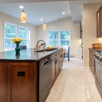 Cheerful Multi Level Rear Addition to Expand Kitchen, Mudroom & Sunroom in Oakt