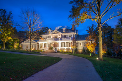 Inspiration for a huge timeless gray three-story exterior home remodel in Columbus