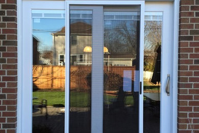 Andersen E-Series patio door installation with transom windows