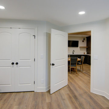 Warm & Inviting Basement Retreat with Kitchenette and Reading Nook