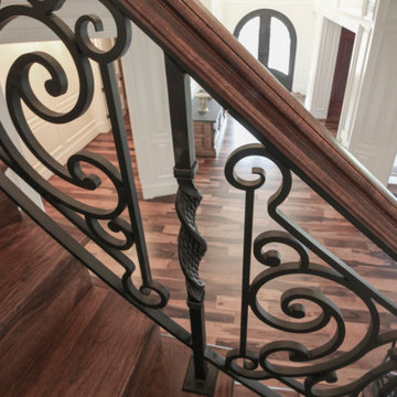 Project #74 | Circular Staircase with Hand-Forged Metal Panels