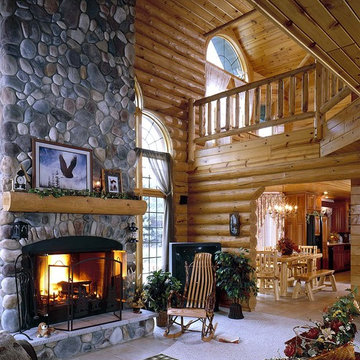 Log home great room tall ceiling massive fireplace Shenandoah