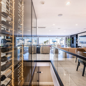 Custom Staircase Glass Wine Cellar & Display Cabinet in Newport Beach