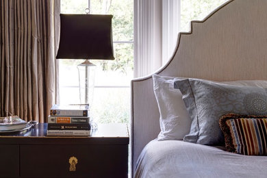 Example of a mid-sized transitional master medium tone wood floor bedroom design in Chicago with gray walls