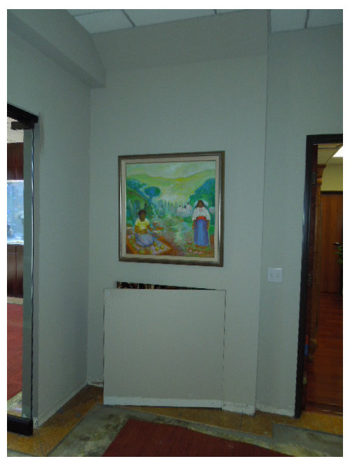 Any ideas on how to blend in this functioning door in the wall?