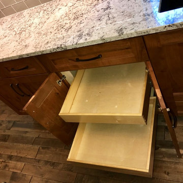 Dura Supreme Cabinets Knotty Alder Butternut Romanix Granite Galley Kitchen