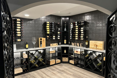 Example of a mid-sized classic wine cellar design in Cincinnati
