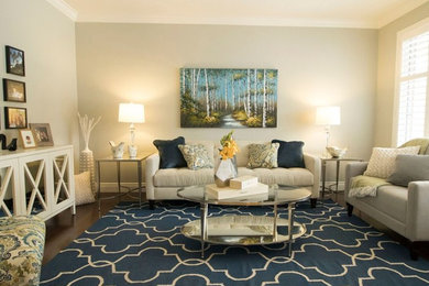 Example of a large transitional formal and enclosed dark wood floor living room design in Ottawa with gray walls, no fireplace and no tv