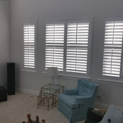 Crestview Shutters using large Deco frame and bi-fold track shutters - Interior Shutters