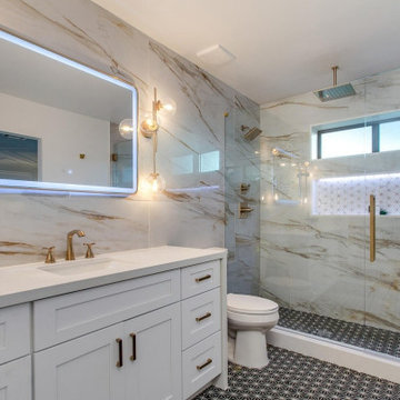 Calacatta Laza Gold complemented with champagne bronze