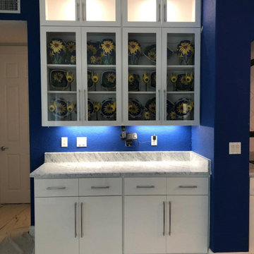 Modern Kitchen Remodel Done in a White Acrylic Glossy Flat Door