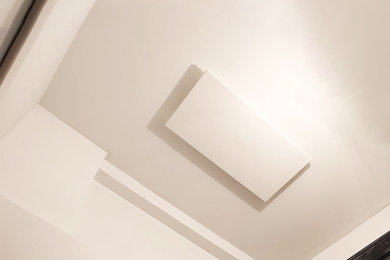 Pose d'un radiateur électrique infrarouge extra plat au plafond