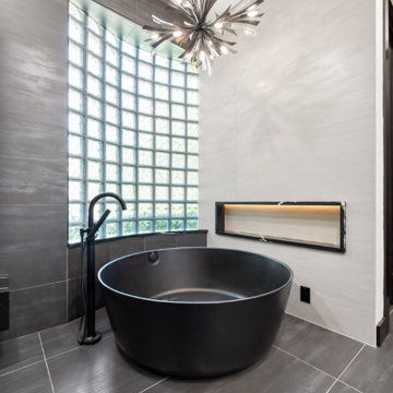 Statement Chandelier and Round Matte Black Tub