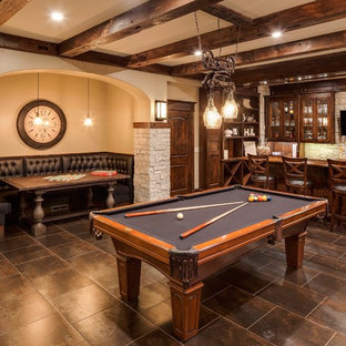 Large classic walk-out basement in Chicago with beige walls, porcelain flooring, a standard fireplace and brown floors.