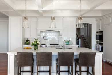 Example of a transitional kitchen design in Toronto