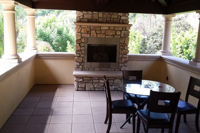 Inspiration for a small mediterranean concrete paver patio remodel in Los Angeles