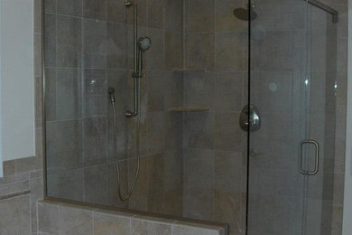 Inspiration for a mid-sized master stone tile ceramic tile bathroom remodel in Other with white walls