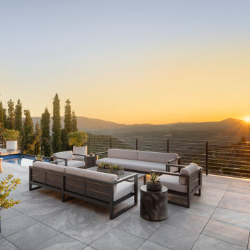 A little farm below a hillside resort-style off-the-grid view home