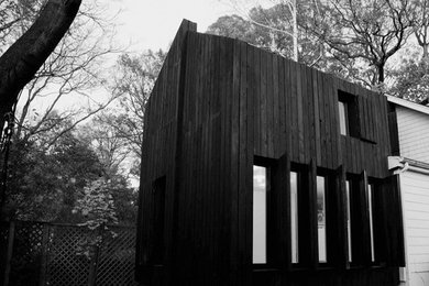 Example of a mountain style home design design in New York