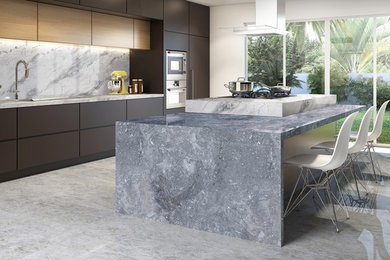 Eat-in kitchen - mid-sized modern porcelain tile and gray floor eat-in kitchen idea in Philadelphia with flat-panel cabinets, dark wood cabinets, granite countertops, white backsplash, stainless steel appliances and an island